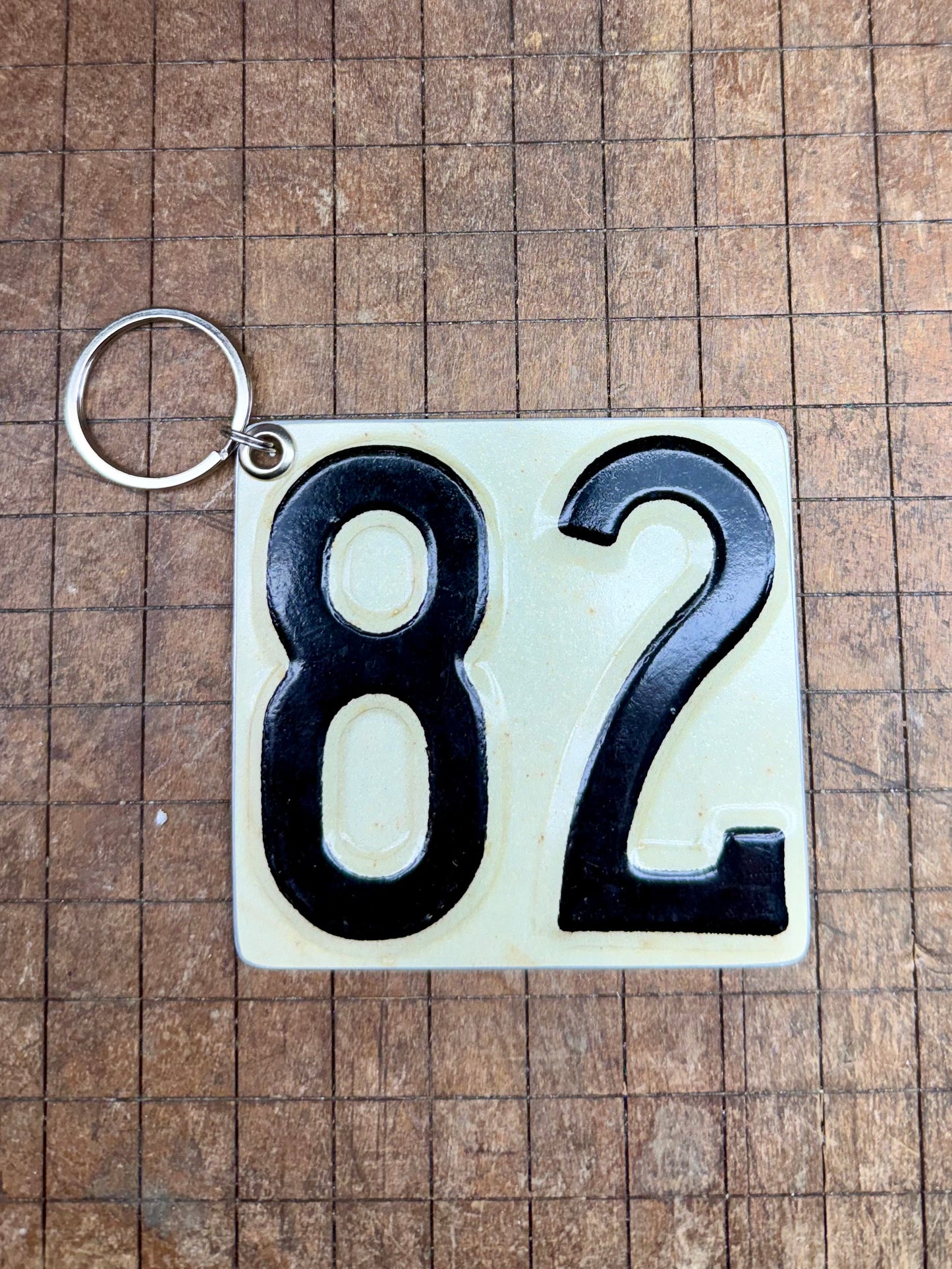 Vintage License Plate Keychain - Number 82